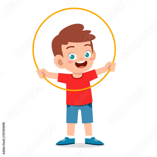 happy cute little kid boy play hula hoop