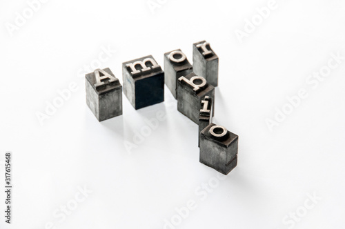 words love and hate represented with block letters on white background