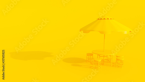 Yellow table and chairs and umbrella © oatintro