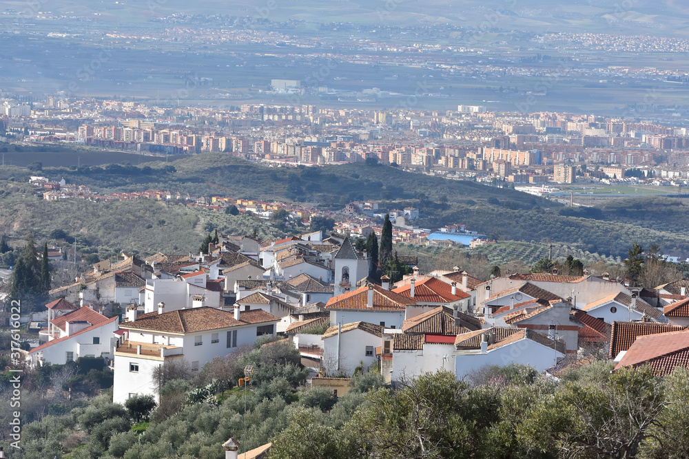Panoramic view of Viznar with Granada and its Vega in the background