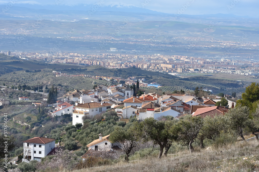 Panoramic view of Viznar with Granada and its Vega in the background