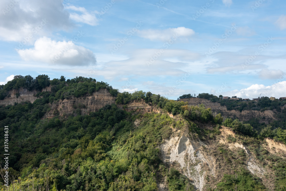 Tuscany landscape with forests and cliffs seen from Bagnoregio, Italy. 