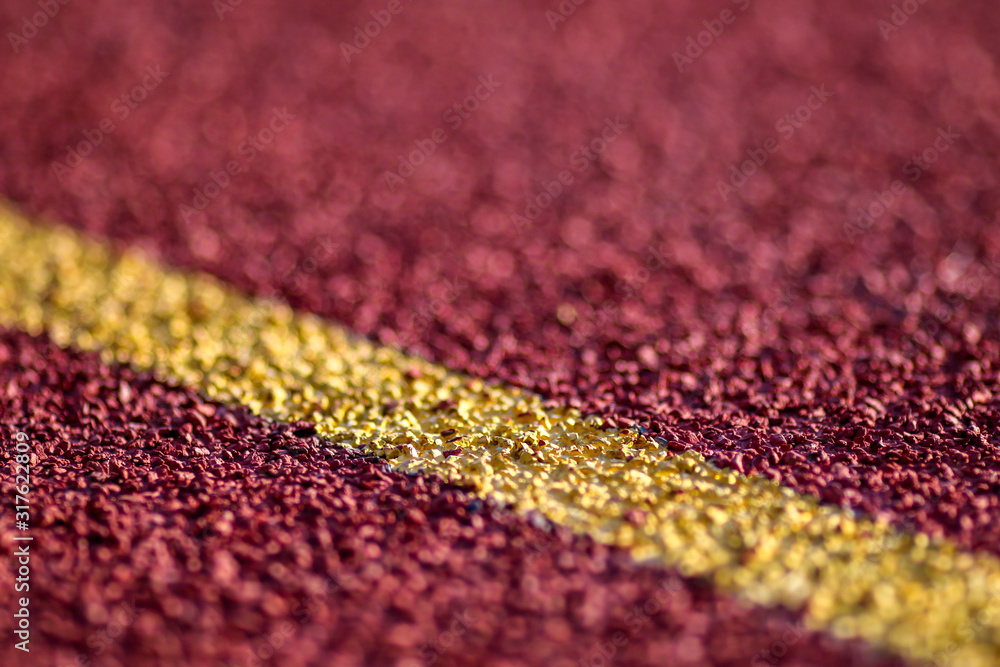 Red running sport track background and texture. Sport running track concept. Red running sport track background and texture. Sport running track concept.