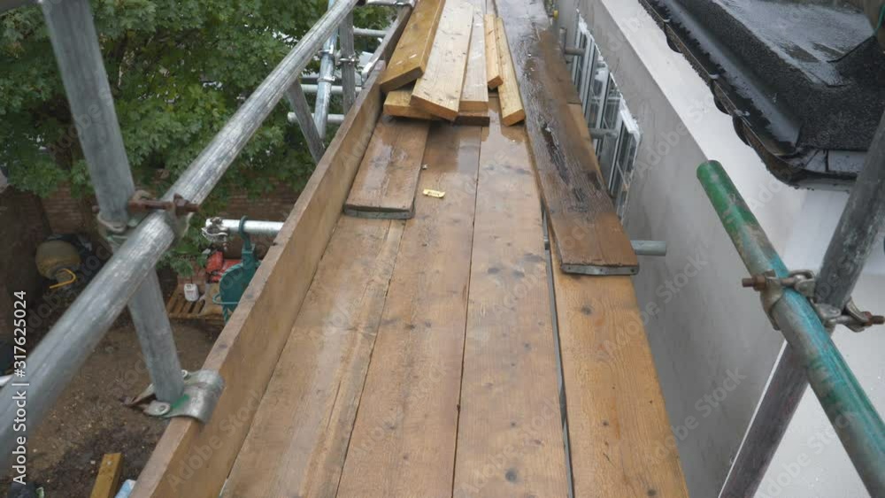A tilt shot shot of scaffolding in a rain. A tilt shot shot of scaffolding in a rain.