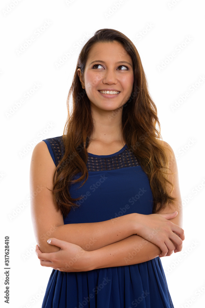 Portrait of happy young beautiful woman thinking with arms crossed Portrait of happy young beautiful woman thinking with arms crossed
