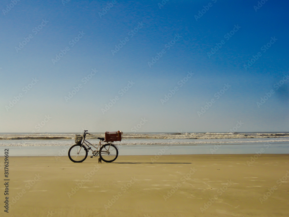 Obraz premium Bicicleta e o mar