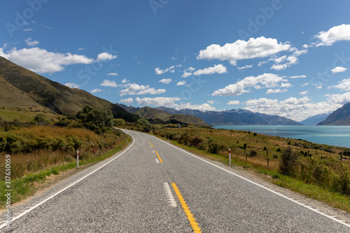 A scenic road next to Lake Hawea in New Zealand