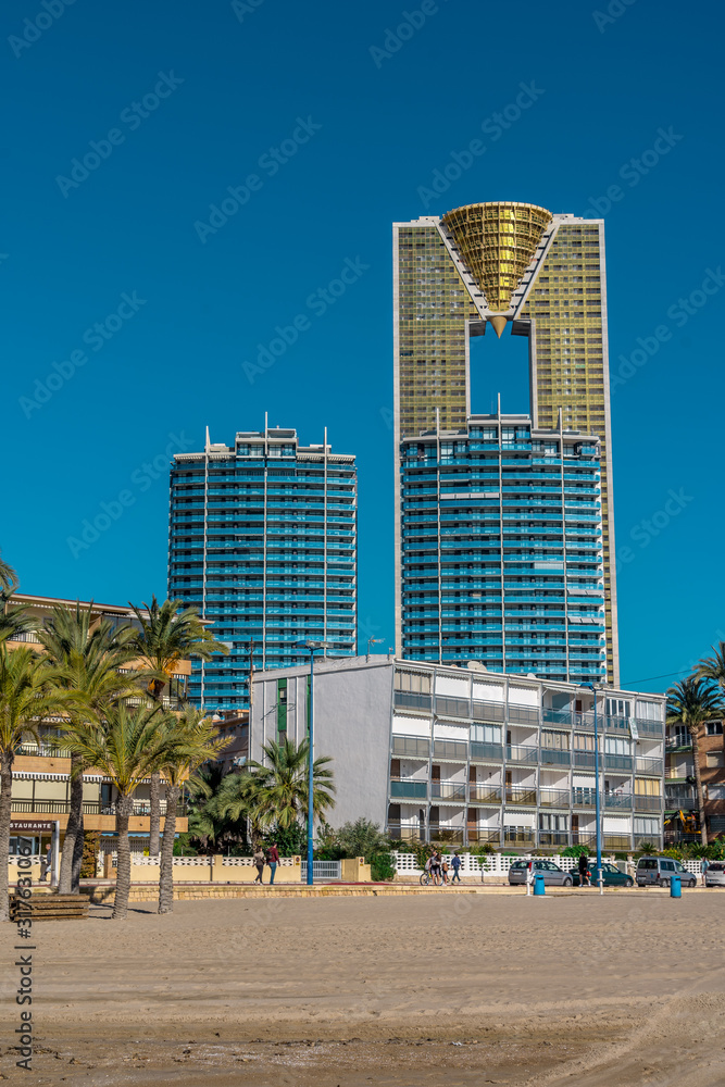 Aerial view of the popular Spanish Mediterranean beach resort town Benidorm with high rise complexes  