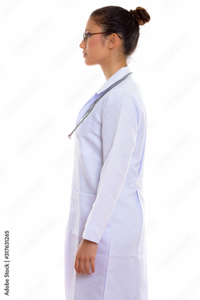 Profile view of young beautiful woman doctor Profile view of young beautiful woman doctor