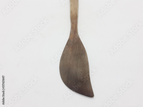 Beautiful Natural Dark Brown Wooden Spoon Spatula in White Isolation Background