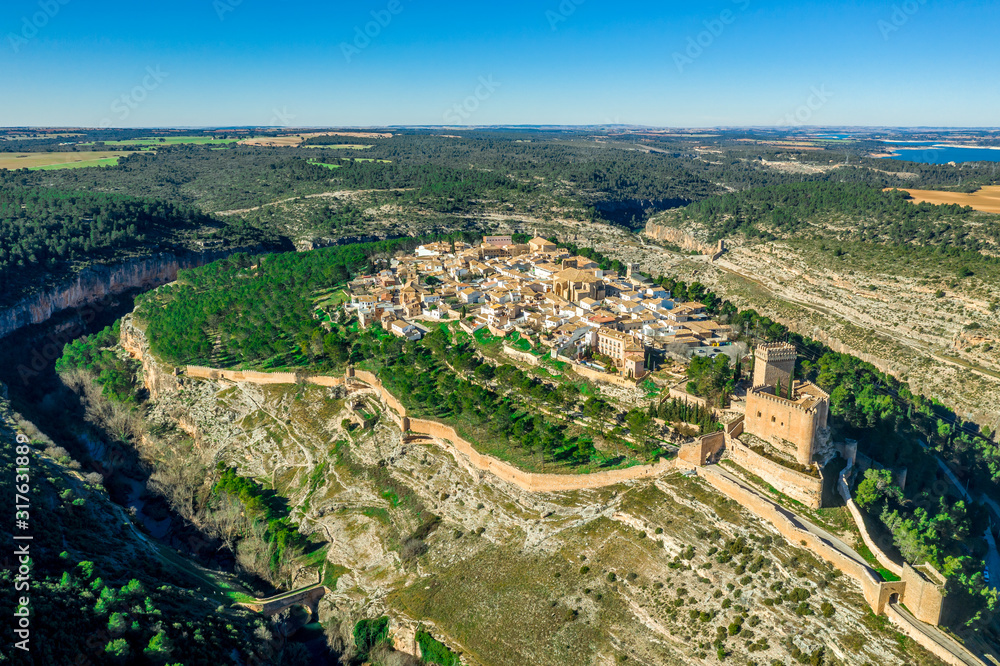 Aerial view of Alarcon castle, parador and fortifications along the Jucar river in Cuenca province Spain