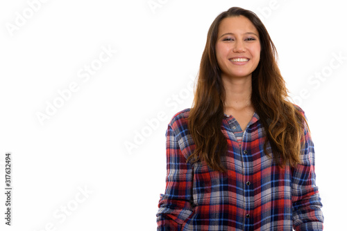 Studio shot of young happy woman smiling © Ranta Images