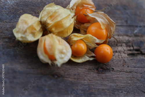 cape gooseberry on wood table