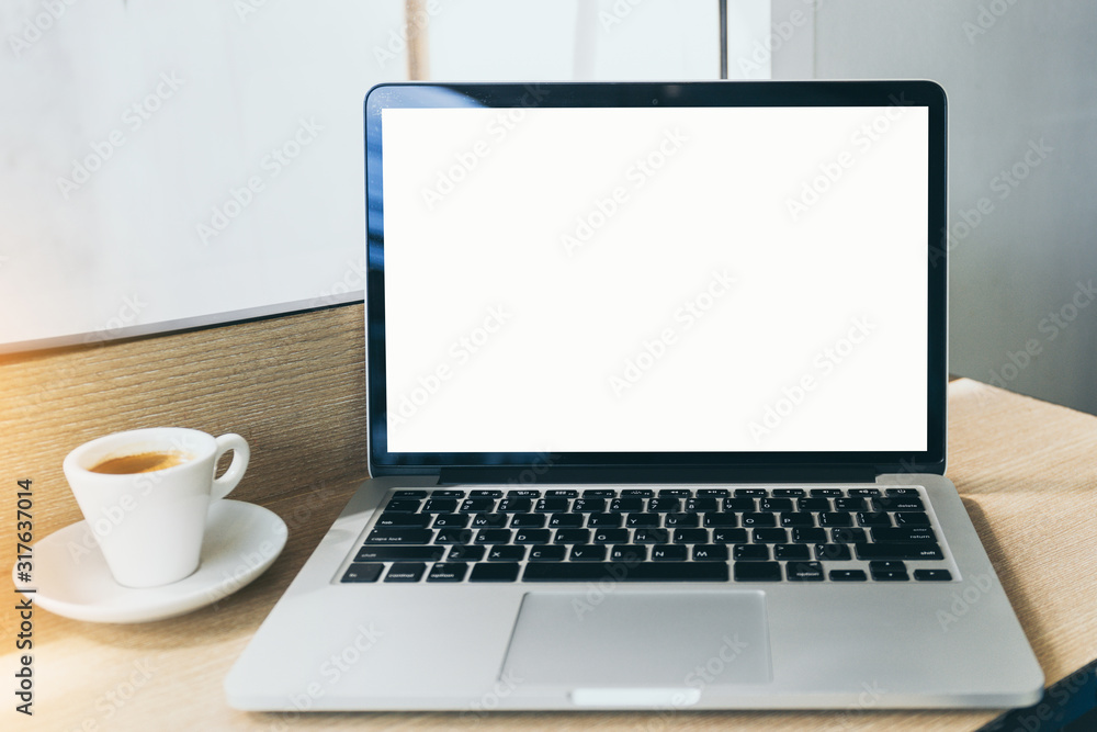 mockup image blank screen computer with white background for advertising text,hand man using laptop contact business search information on desk at coffee shop.marketing and creative design mockup image blank screen computer with white background for advertising text,hand man using laptop contact business search information on desk at coffee shop.marketing and creative design