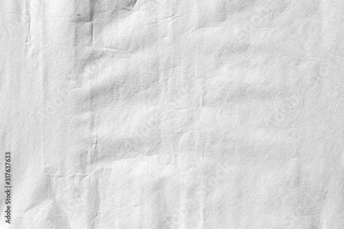 Grey crumpled background paper texture