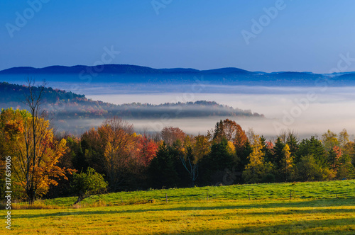 Morning sunrise during fall foliage season  Stowe  Vermont  USA