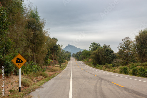 Road in the fog mountain.