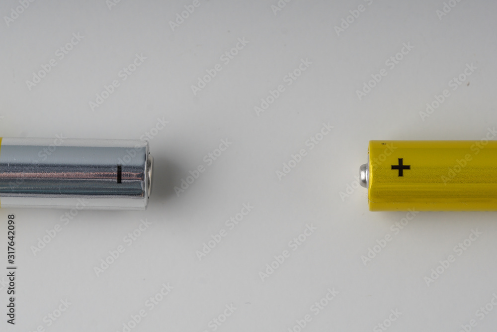 Two AAA batery , left and right over white background. Two AAA batery , left and right over white background.