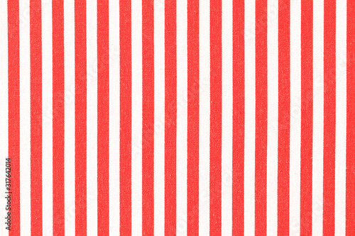 Closeup red and white color wall texture for background.Beautiful bright abstract striped pattern.