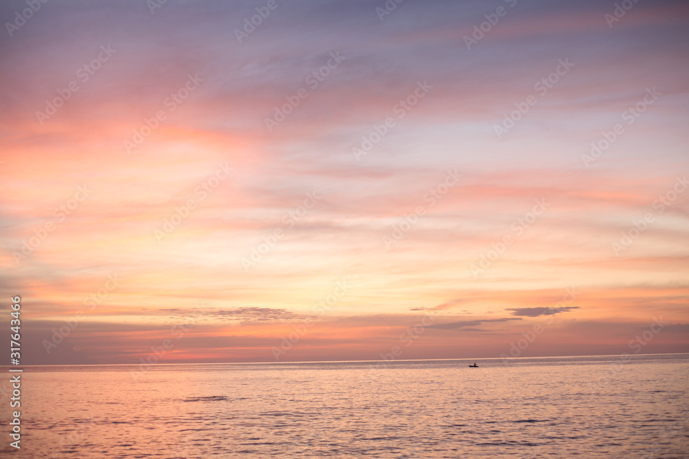 Sea pink sunset. Beautiful color clouds.