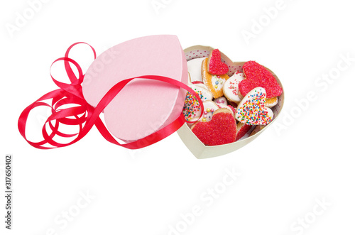 Cookies in the Shape of Heart Decorated with Ribbon at St Valentine's Day Isolated on White with clipping path,