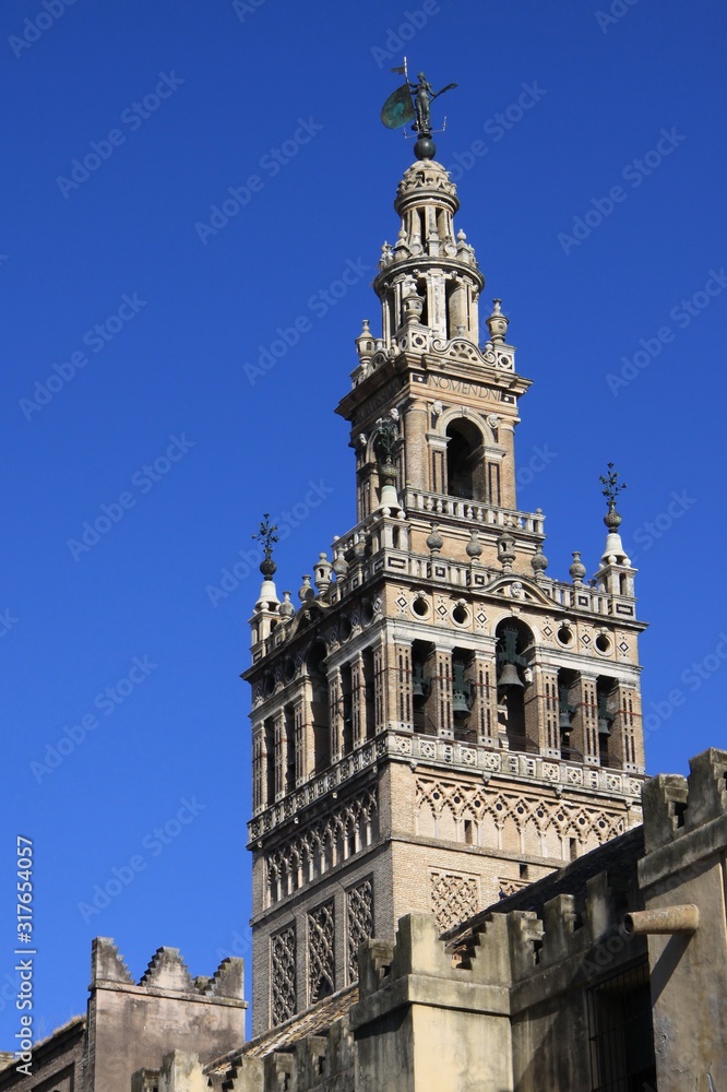 Giralda bell tower of Seville Cathedral, the largest Gothic Cathedral in Europe Giralda bell tower of Seville Cathedral, the largest Gothic Cathedral in Europe