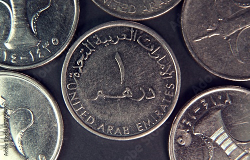 One UAE dirhams isolated on black background, macro shot of United Arab Emirates one dirham isolated , Coffee pot 
