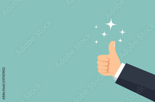 Hand up and Spark. The hand of a business man with a great thumbs up. © Bird's