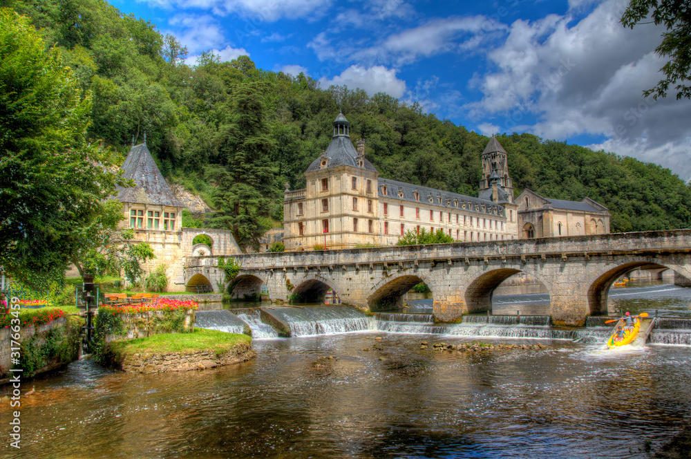 Bridge and Abbey of of the Beautiful Village of Brantome, France
