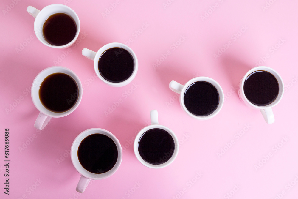many cups of coffee on a colored background. Good morning coffee break concept. Flat lay top view composition. many cups of coffee on a colored background. Good morning coffee break concept. Flat lay top view composition.