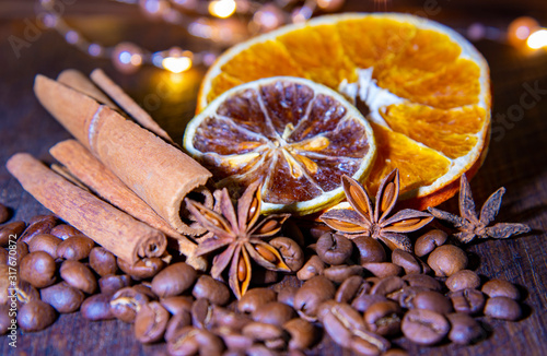 Coffee beans with citrus cinnamon sticks and star anise