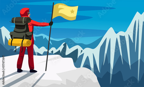 Man climber with flag on snowed mountain peak