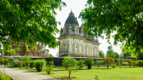 Famous indian Madhya Pradesh tourist landmark - Kandariya Mahadev Temple, Khajuraho, India. Unesco World Heritage Site photo
