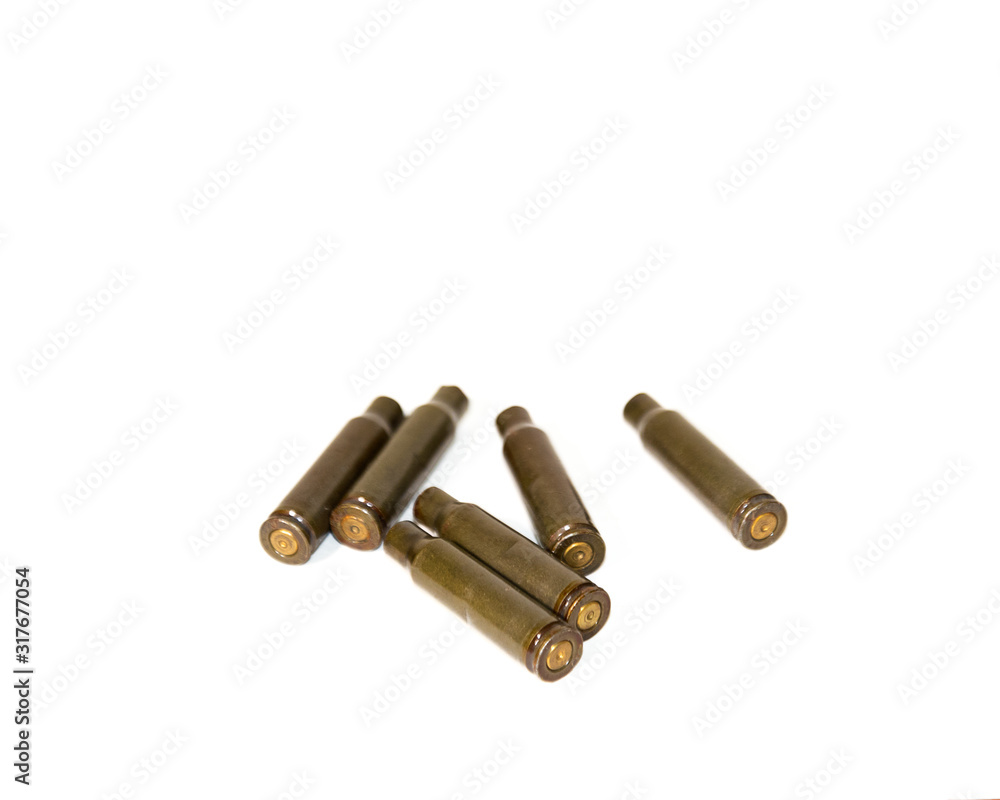 empty shells from cartridges for a firearm on a white background empty shells from cartridges for a firearm on a white background