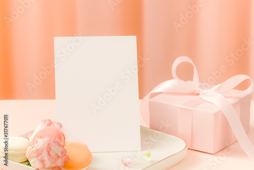 Anniversary, mother's day or women day holiday concept with cake and gift