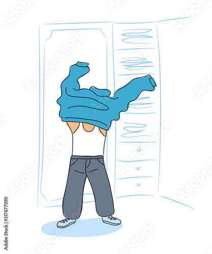 Funny boy dress up clothes in home wardrobe room