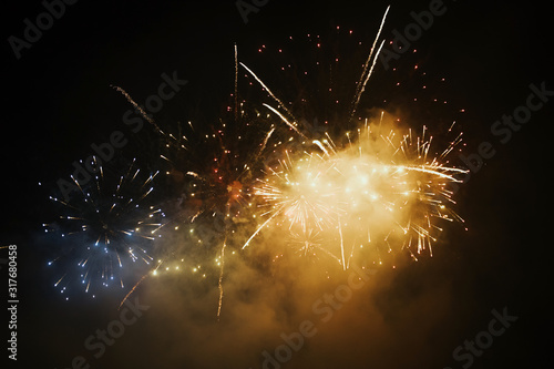 Fireworks overlay for holiday backgrounds with copy-space.