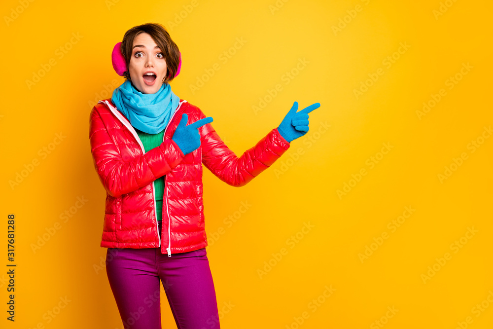 Photo of funny lady open mouth indicate fingers empty space final season low prices wear casual red coat blue scarf gloves ear warmers pants isolated yellow color background Photo of funny lady open mouth indicate fingers empty space final season low prices wear casual red coat blue scarf gloves ear warmers pants isolated yellow color background