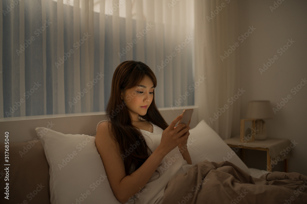 Young woman read message on cellphone Young woman read message on cellphone