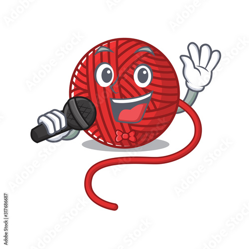 Happy red wool yarn singing on a microphone