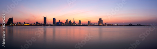 A panoramic view of Bahrain skyline during sunset  Bahrain