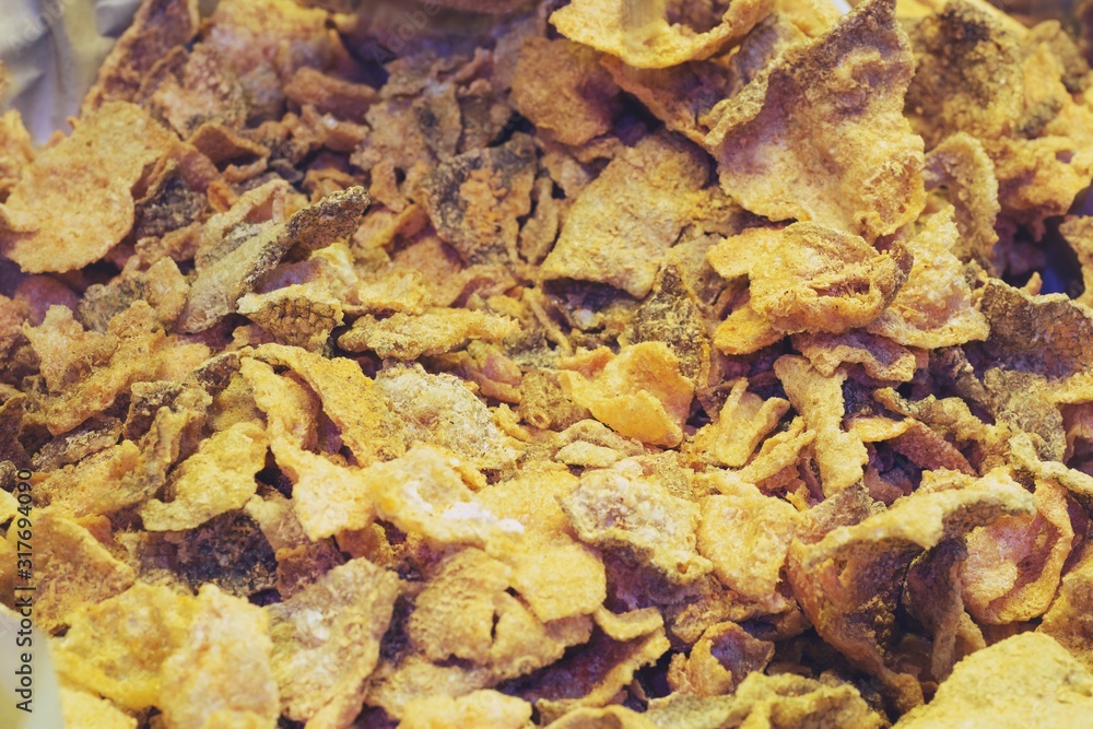 Crispy salted egg fried salmon skin, thai street food market Crispy salted egg fried salmon skin, thai street food market