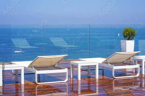 View from the hotel terrace of the suite rooms on the blue sea. View of the morning horizon of the sea, the ocean.