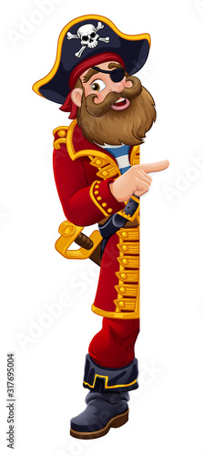 Friendly pirate captain cartoon character peeking around a sign background and pointing at it