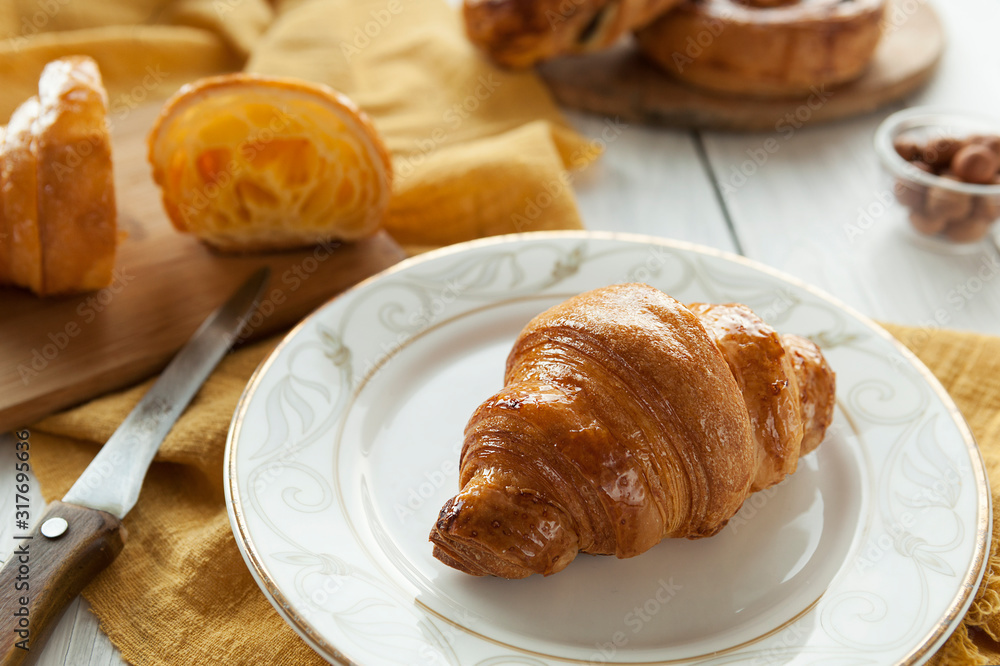 Croissant Puff pastry bagel. Traditional european pastries. French cuisine