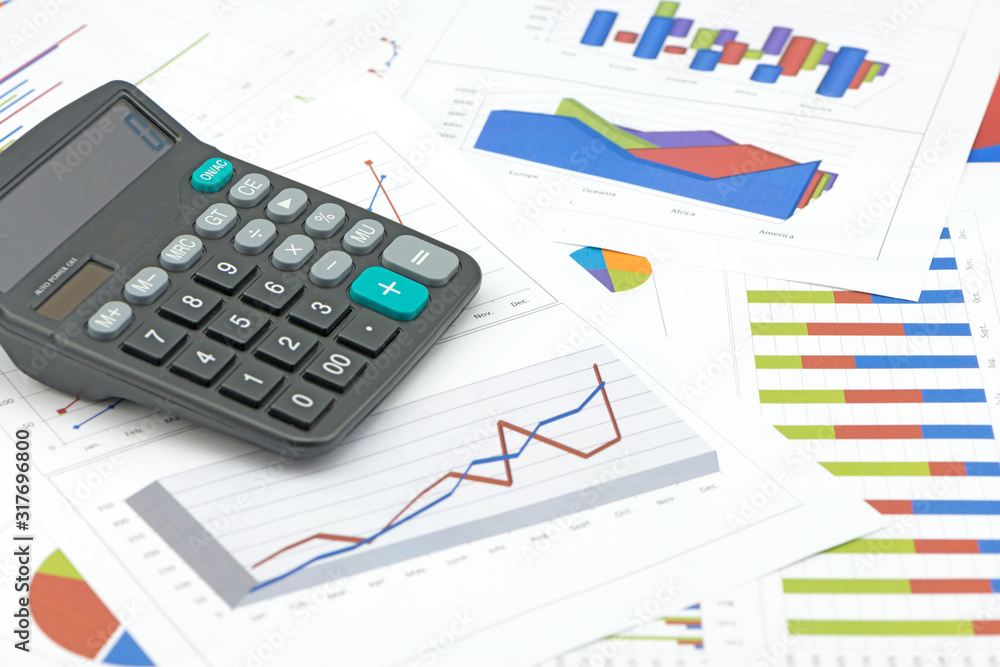 calculator on paper table with diagram calculator on paper table with diagram