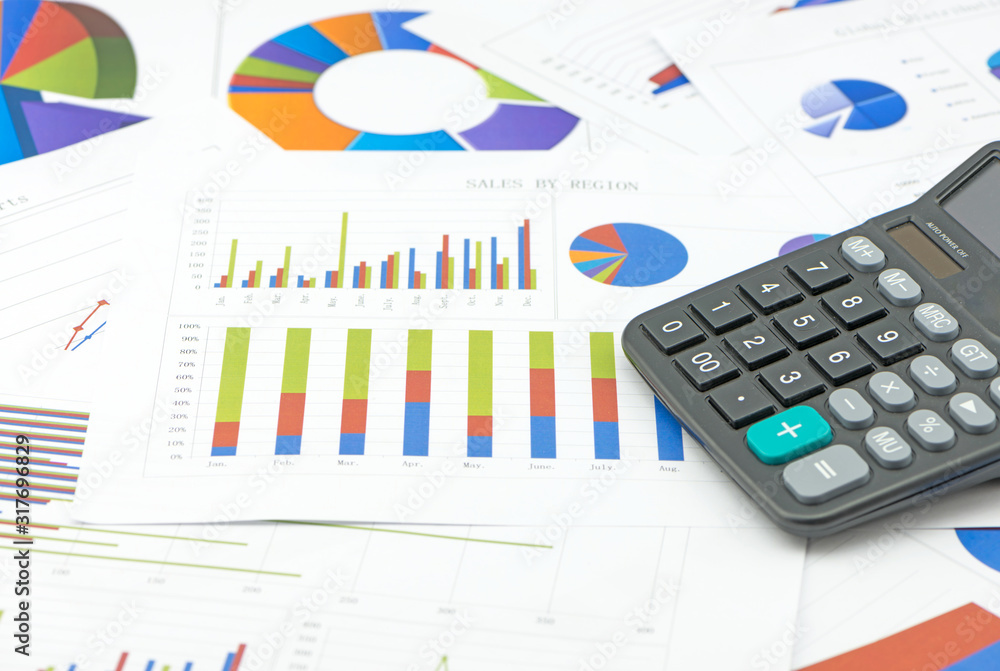 calculator on paper table with diagram calculator on paper table with diagram