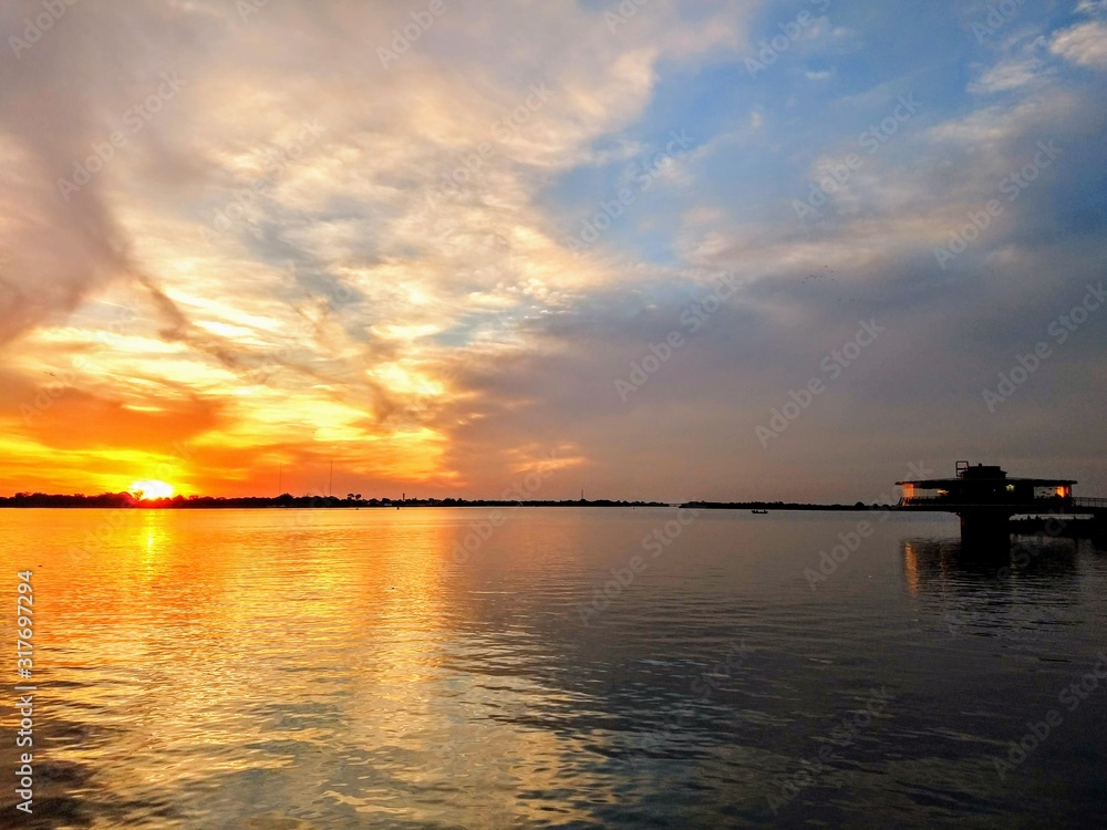 A sunset porto on the lake shore
