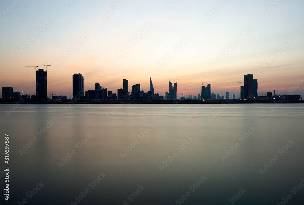 Bahrain skyline and dramatic hue at sunset, Bahrain
