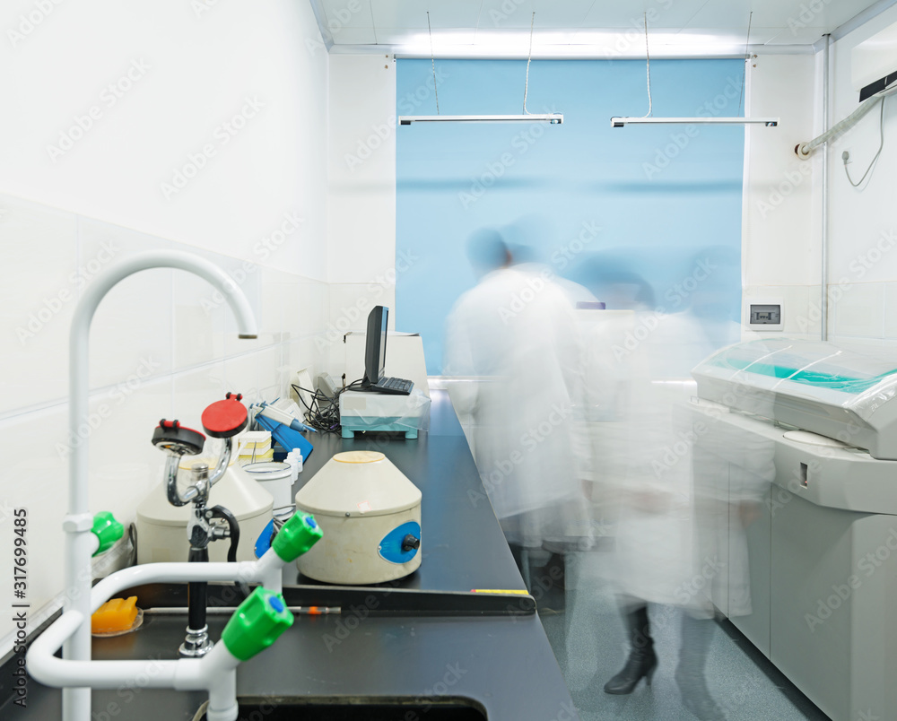 young researcher works in chemistry laboratory young researcher works in chemistry laboratory